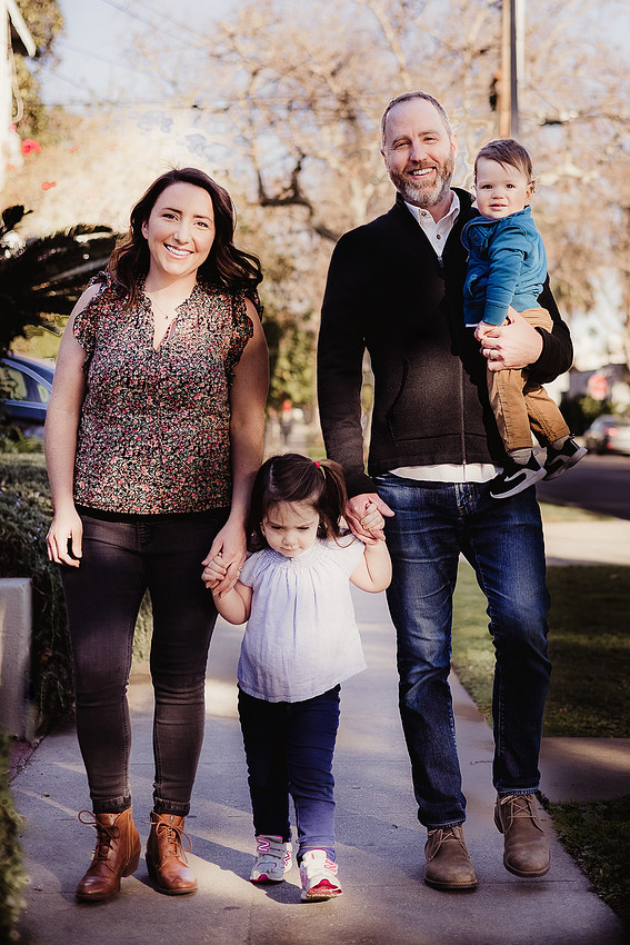 Family of four in the birthday photo session at Poinsettia, LA.